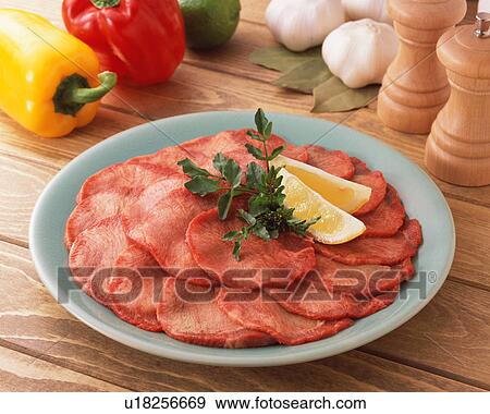 Fresh ox tongue in a plate View Large Photo Image Stock Photo - Fresh ox tongue in a plate. Fotosearch
