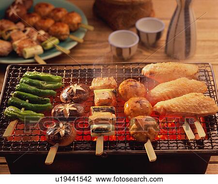 Grilled yakitori over charcoal View Large Photo Image Stock Image - Grilled yakitori over charcoal. Fotosearch