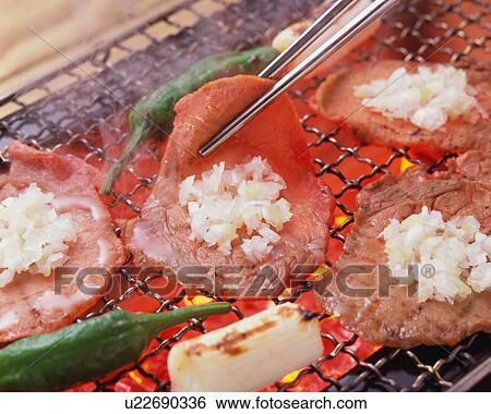 Slices of ox tongue grilled over charcoal View Large Photo Image Stock Photograph - Slices of ox tongue grilled over charcoal. Fotosearch
