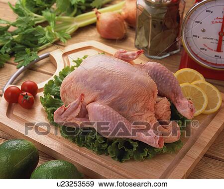 Uncooked chicken View Large Photo Image Stock Photo - Uncooked chicken. Fotosearch