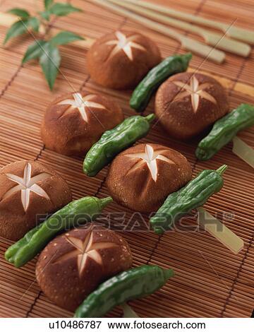Uncooked shiitake mushroom View Large Photo Image Stock Photo - Uncooked shiitake mushroom. Fotosearch