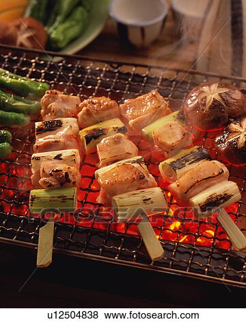 Stock Photo - Yakitori grilled over charcoal. Fotosearch