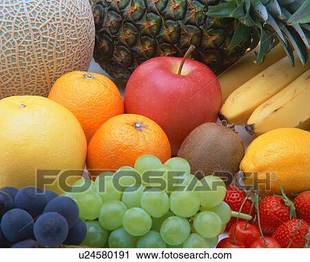 Stock Image - Assorted fruit, close-up. Fotosearch