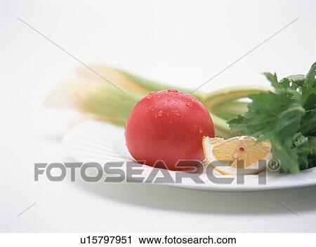 Stock Image - Vegetables on plate, close-up. Fotosearch