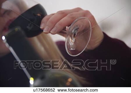Woman drinking red wine, close up View Large Photo Image Stock Image - Woman drinking red wine, close up. Fotosearch