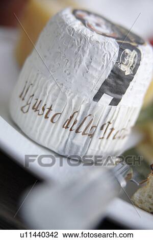 Close up of cheese on plate with knife View Large Photo Image Stock Image - Close up of cheese on plate with knife. Fotosearch