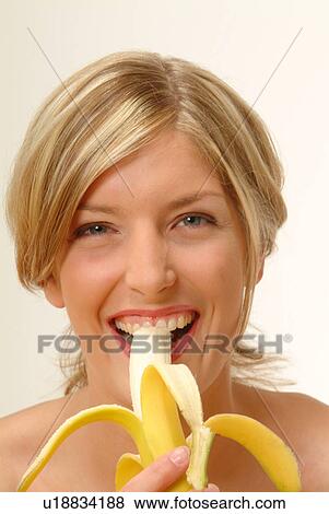 Portrait of Woman eating banana View Large Photo Image Stock Photo - Portrait of Woman eating banana. Fotosearch
