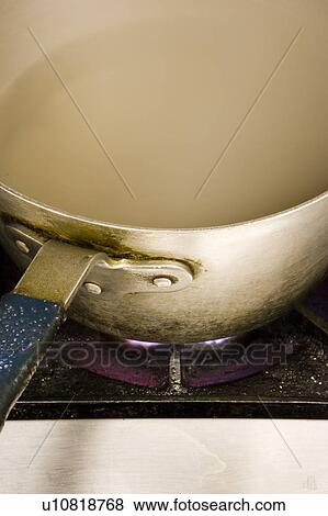 Pot Boiling over Dirty Gas Burner View Large Photo Image Stock Photo - Pot Boiling over Dirty Gas Burner. Fotosearch
