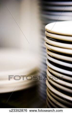 Stacked white dishware View Large Photo Image Stock Photograph - Stacked white dishware. Fotosearch