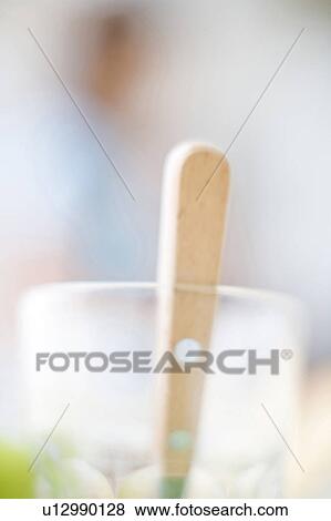 Glass and a spoon View Large Photo Image Stock Photo - Glass and a spoon. Fotosearch