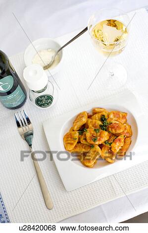 Stock Photo - Tomato sauce gnocchi. Fotosearch