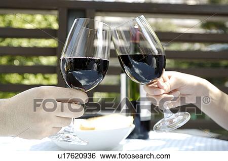 Stock Photograph - Drinking the wine. Fotosearch
