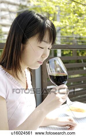 Woman tasting wine View Large Photo Image Stock Image - Woman tasting wine. Fotosearch