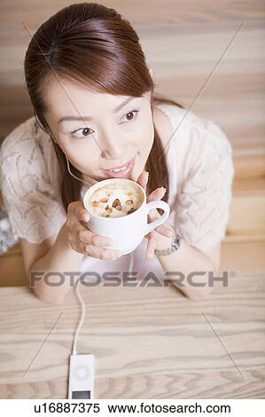 Woman who drinks coffee View Large Photo Image Stock Photography - Woman who drinks coffee. Fotosearch