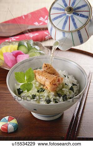 Stock Photo - Bowl of rice with green tea. Fotosearch