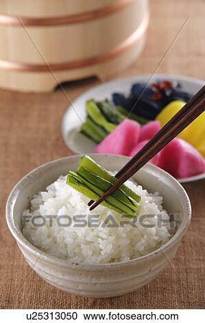 Stock Image - Steamed rice and pickles. Fotosearch