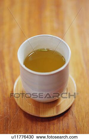A cup of green tea View Large Photo Image Stock Image - A cup of green tea. Fotosearch
