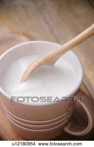 A cup of hot milk View Large Photo Image Picture - A cup of hot milk. Fotosearch