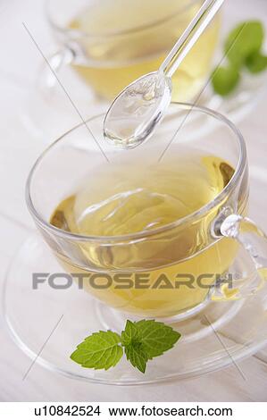 Picture - Cups of herbal tea. Fotosearch