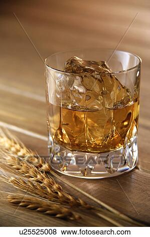 Glasses of whiskey View Large Photo Image Stock Photo - Glasses of whiskey. Fotosearch