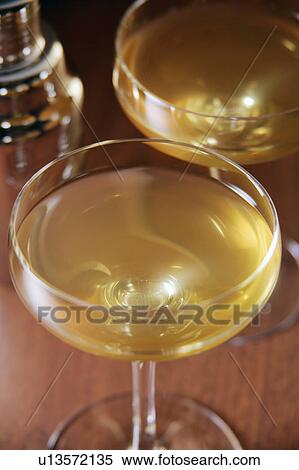 Two glasses of cocktail View Large Photo Image Stock Photography - Two glasses of cocktail. Fotosearch