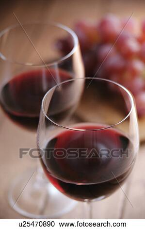 Two glasses of red wine View Large Photo Image Stock Image - Two glasses of red wine. Fotosearch