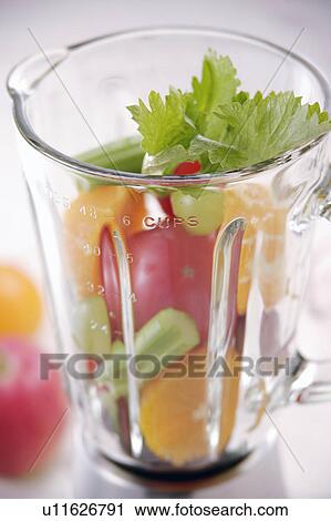 Vegetables in juicer View Large Photo Image Stock Image - Vegetables in juicer. Fotosearch