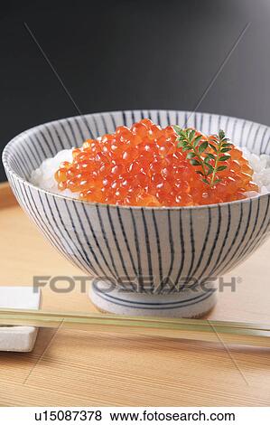 Stock Photo - Salmon roe on rice in bowl. Fotosearch