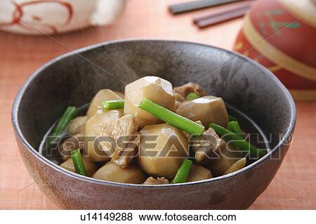 Stock Photo - Simmered chicken and aroid. Fotosearch