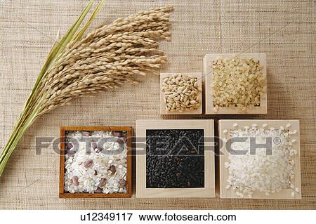 Stock Photo - Assorted uncooked rice in cups. Fotosearch