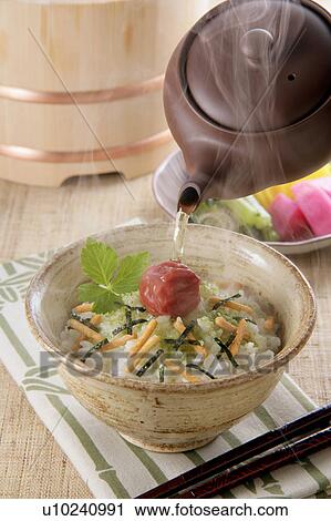 Bowl of rice with green tea View Large Photo Image Stock Image - Bowl of rice with green tea. Fotosearch