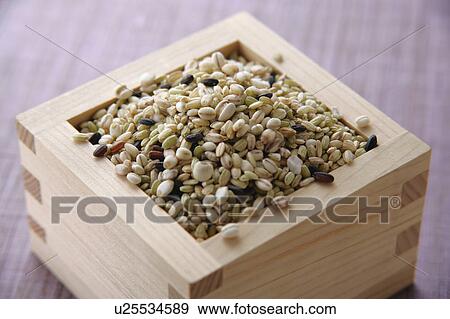 Stock Photo - Coarse Cereal in a cup. Fotosearch