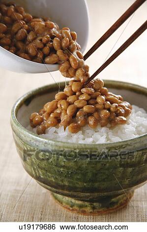 Stock Photograph - Fermented soybeans on steamed rice. Fotosearch