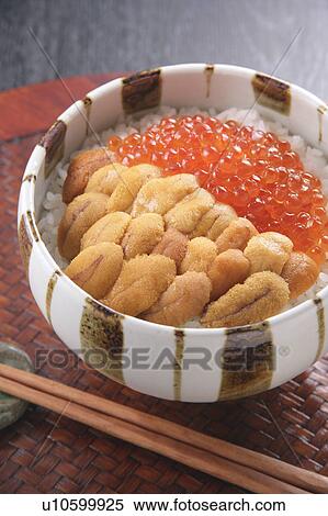 Stock Photography - Sea urchin and salmon roe on rice in bowl. Fotosearch