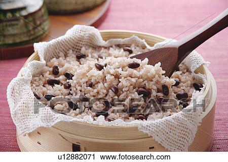 Steamed red rice with beans, close-up View Large Photo Image Stock Image - Steamed red rice with beans, close-up. Fotosearch