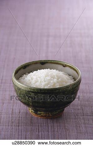 Stock Image - Steamed rice in a rice bowl. Fotosearch