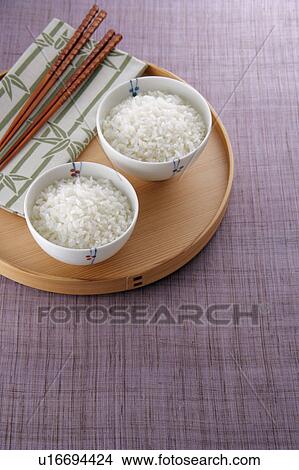 Picture - Steamed rice in rice bowl. Fotosearch