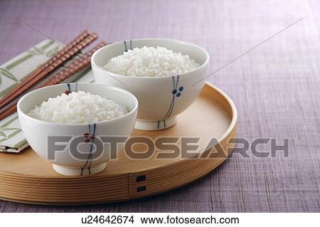 Picture - Steamed rice in rice bowl. Fotosearch