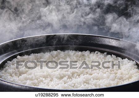 Steamed rice in steamer View Large Photo Image Stock Photography - Steamed rice in steamer. Fotosearch