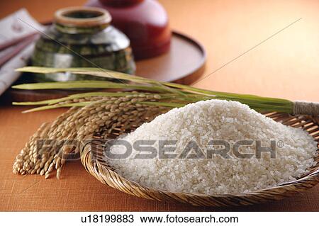 Uncooked rice and rice bowls View Large Photo Image Stock Image - Uncooked rice and rice bowls. Fotosearch