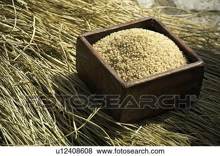 Stock Photo - White rice and hay. Fotosearch