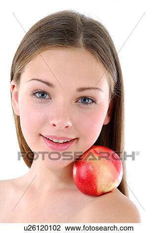 Portrait of a young woman with a peach on her shoulder View Large Photo Image Stock Image - Portrait of a young woman with a peach on her shoulder. Fotosearch