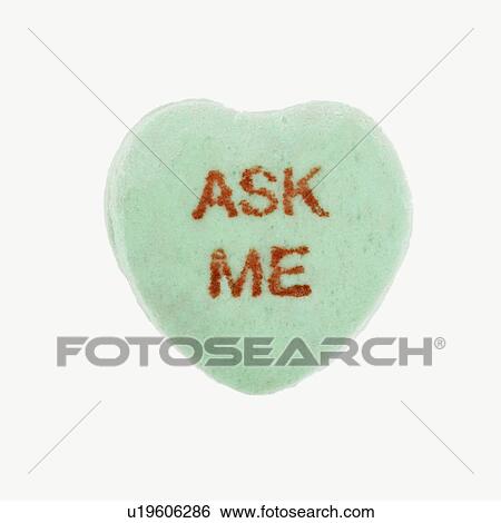 Green candy heart that reads ask me against white background. View Large Photo Image Stock Photograph - Green candy heart that reads ask me against white background.. Fotosearch