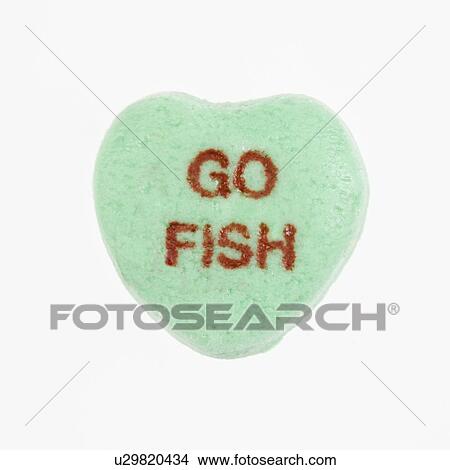 Green candy heart that reads go fish against white background. View Large Photo Image Picture - Green candy heart that reads go fish against white background.. Fotosearch