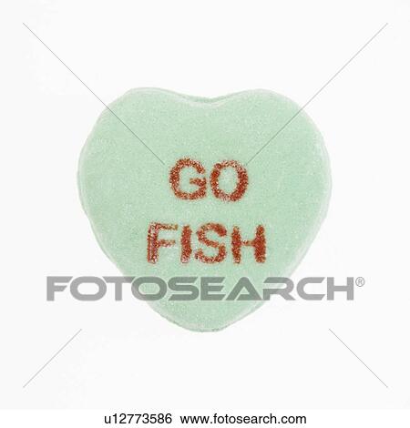 Green candy heart that reads go fish against white background. View Large Photo Image Stock Photograph - Green candy heart that reads go fish against white background.. Fotosearch