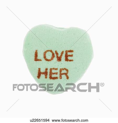 Green candy heart that reads love her against white background. View Large Photo Image Picture - Green candy heart that reads love her against white background.. Fotosearch