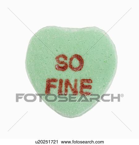 Stock Image - Green candy heart that reads so fine against white background.. Fotosearch