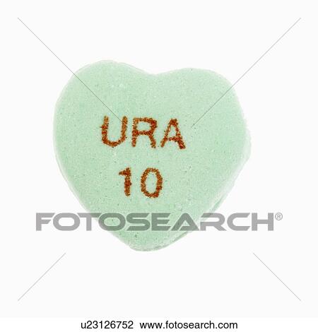 Stock Image - Green candy heart that reads URA 10 against white background.. Fotosearch