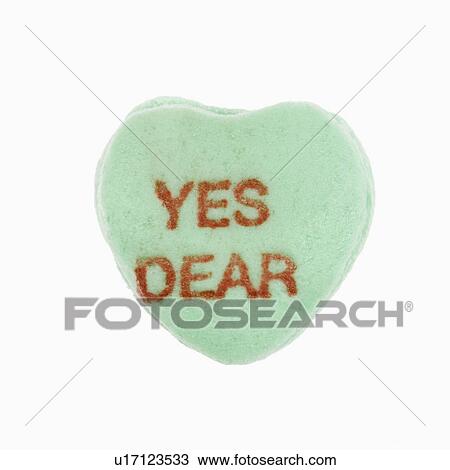 Green candy heart that reads yes dear against white background. View Large Photo Image Stock Image - Green candy heart that reads yes dear against white background.. Fotosearch