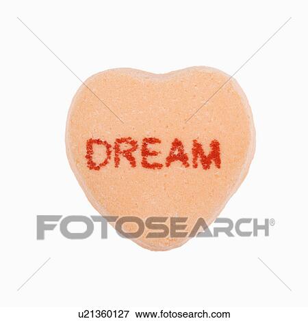 Orange candy heart that reads dream against white background. View Large Photo Image Stock Photo - Orange candy heart that reads dream against white background.. Fotosearch